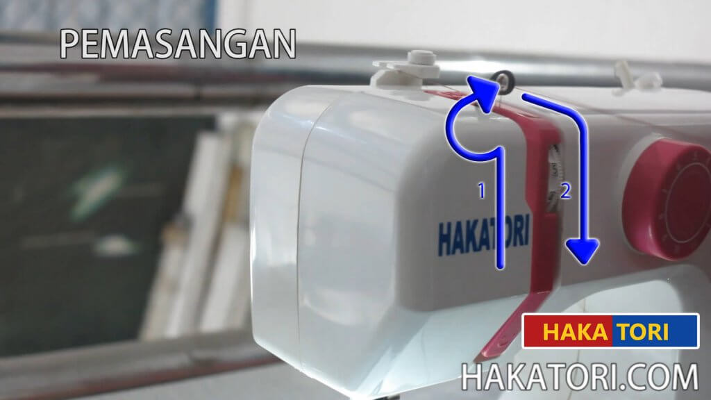 Pasang benang sesuai jalur pada mesin